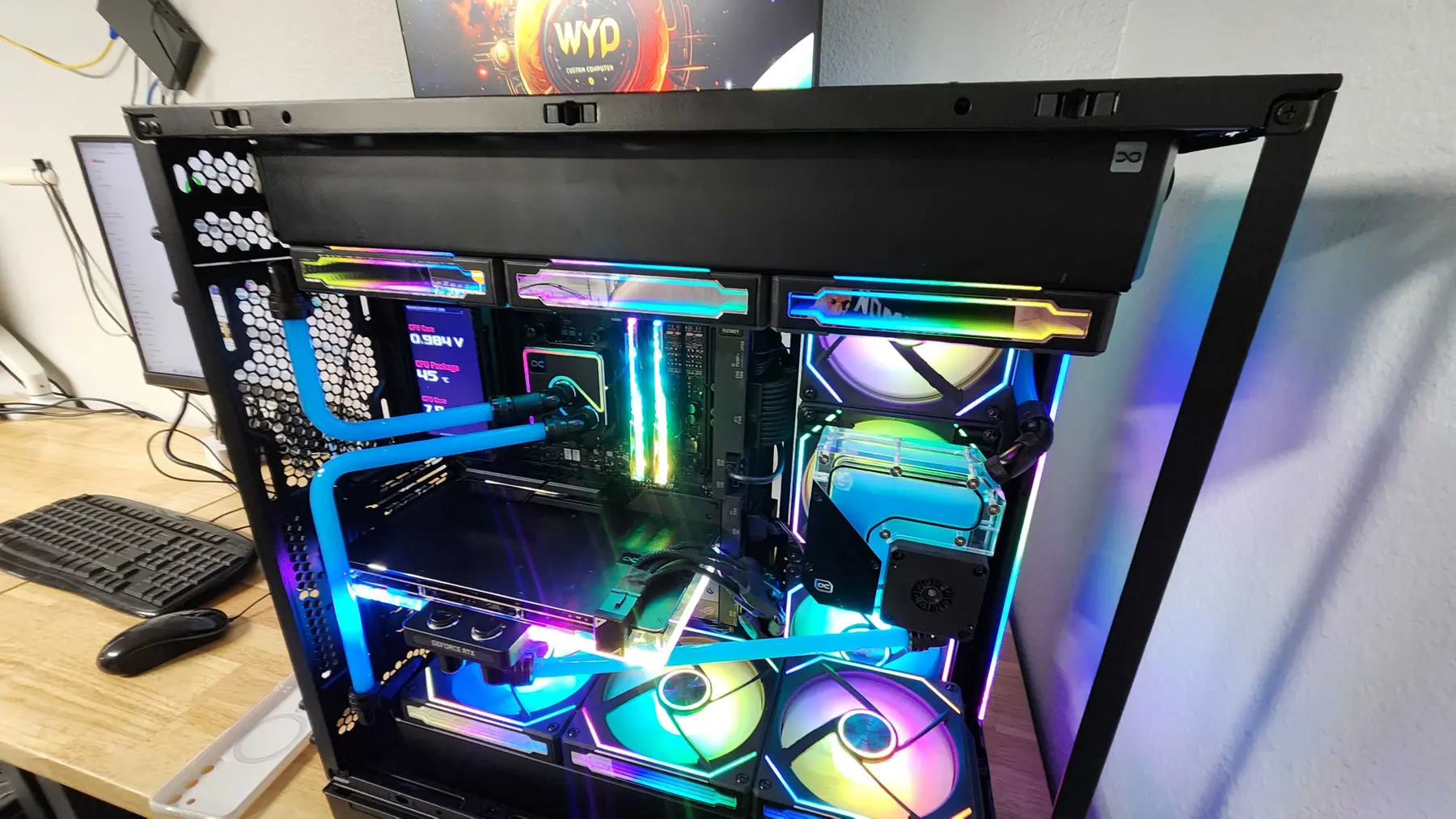 Colorfully lit custom gaming computer assembled and cable-managed by Who's Your Data?